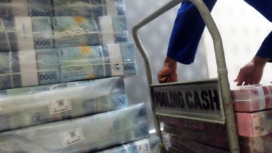 Tumpukan uang rupiah. Foto: Antara