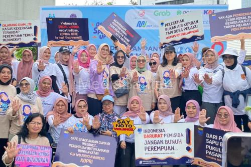 Seruan untuk menghentikan kekerasan terhadap perempuan. Foto: Antara