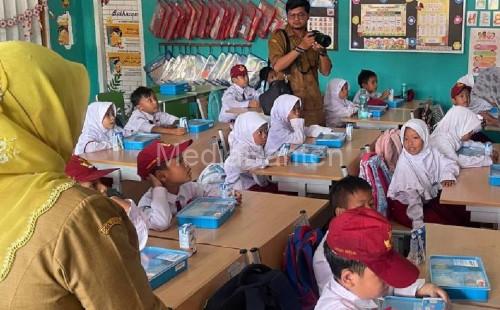 Uji coba makan bergizi gratis. Foto: Antara