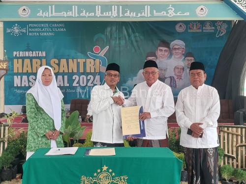 PCNU Kota Serang melakukan MoU dengan Unbaja dan PKBM Daguina. Foto: Taufik Hidayat