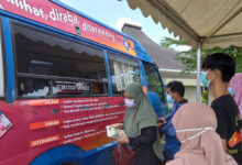 penukaran uang di kas keliling Bank Indonesia.