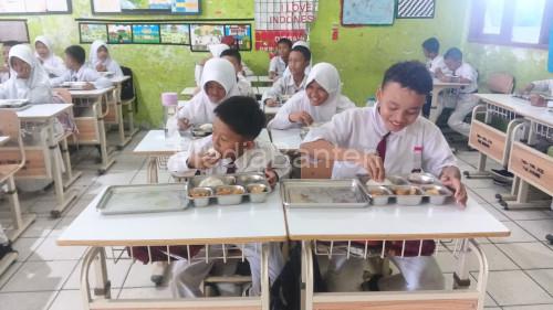 SPPG Polres Serang mendistribusikan 2.166 porski makanan bergizi. Foto Yono
