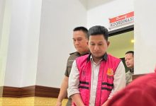 Salah satu tersangka penyimpangan KMK di BJB Tangerang. Foto: Budi Wahyu Iskandar
